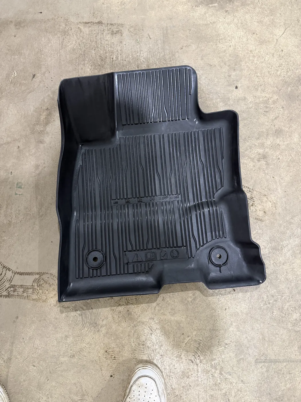 The same mat cleaned back to black